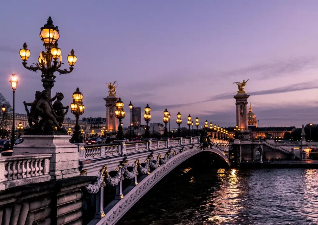 Pont Alexandre III bridge with ornate lamps at dusk, Paris